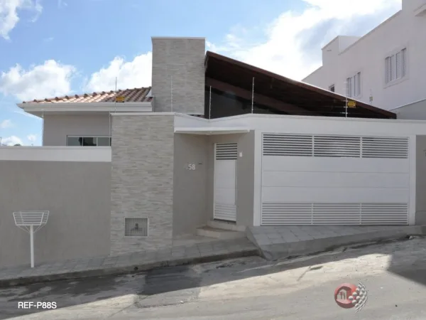 Portão Basculante Fechado no Meio Branco - Atual Esquadrias